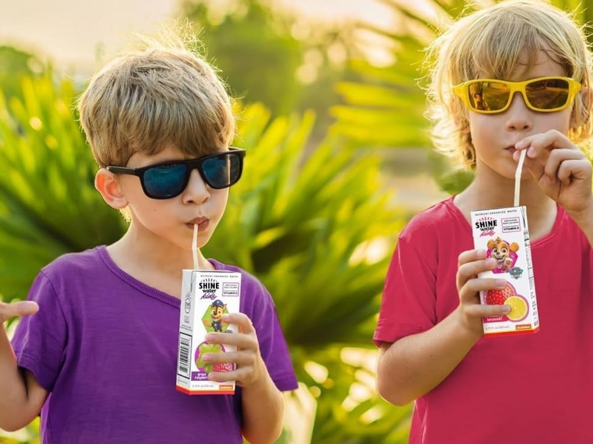 Kids drinking ShineWater Kids